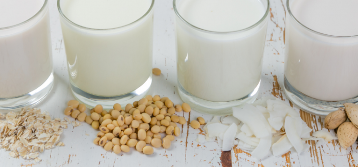 nondairy milks, comparing types of nut milks, milk comparison soy oat coconut